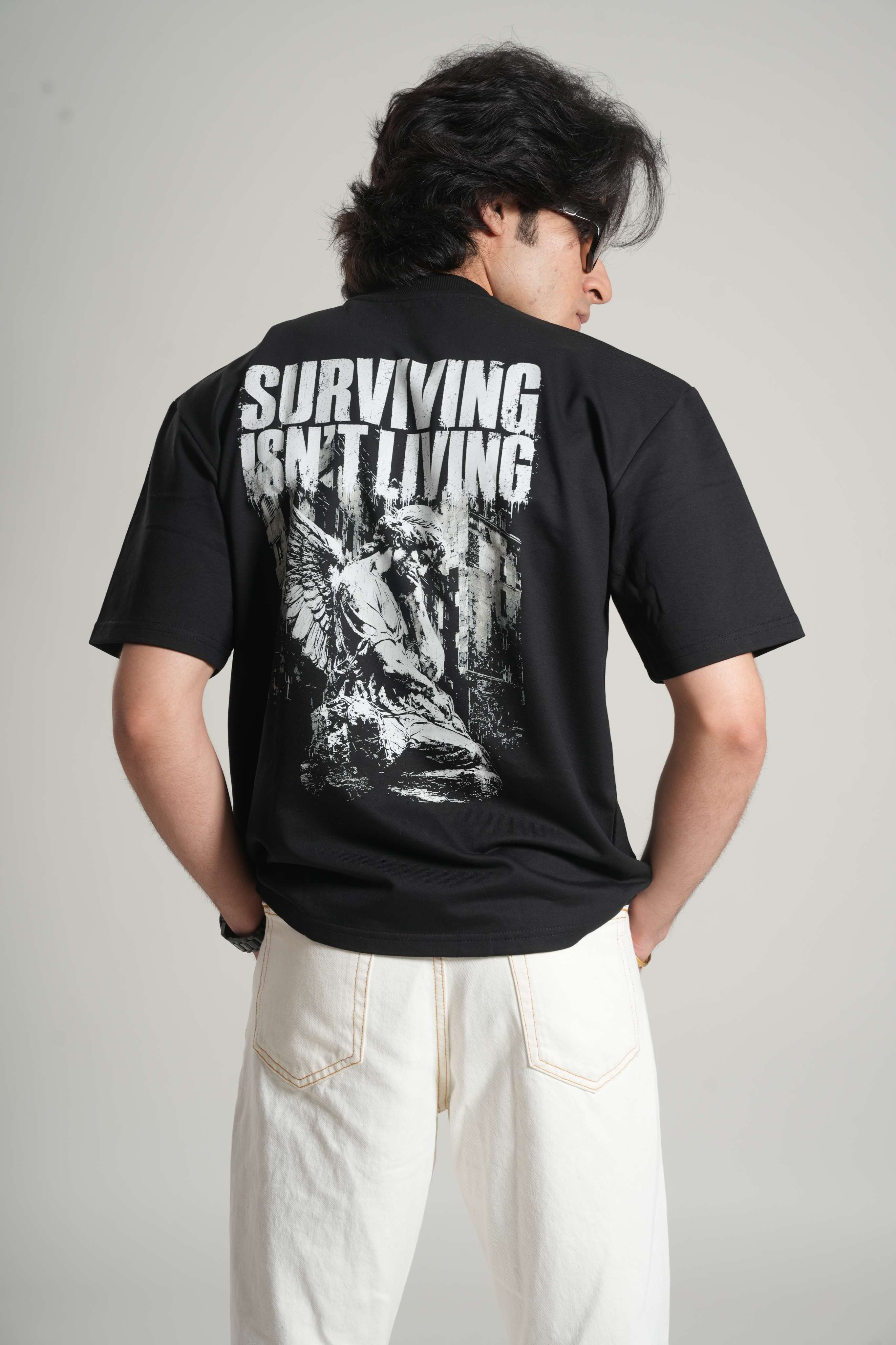 SURVIVING ISN'T LIVING – Oversized Tee