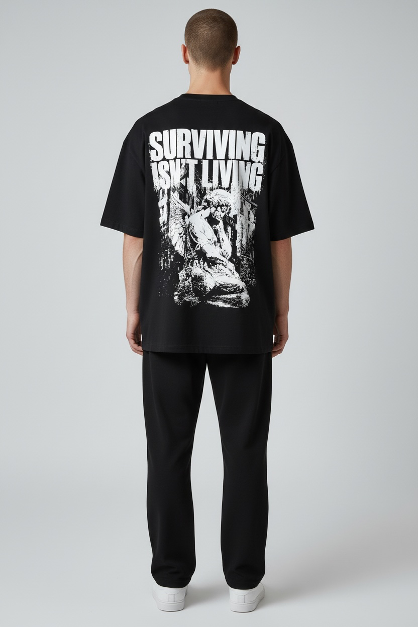 SURVIVING ISN'T LIVING – Oversized Tee