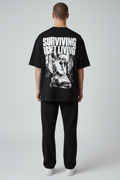 SURVIVING ISN'T LIVING – Oversized Tee
