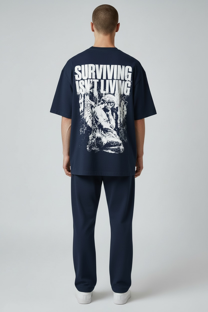 SURVIVING ISN'T LIVING – Oversized Tee