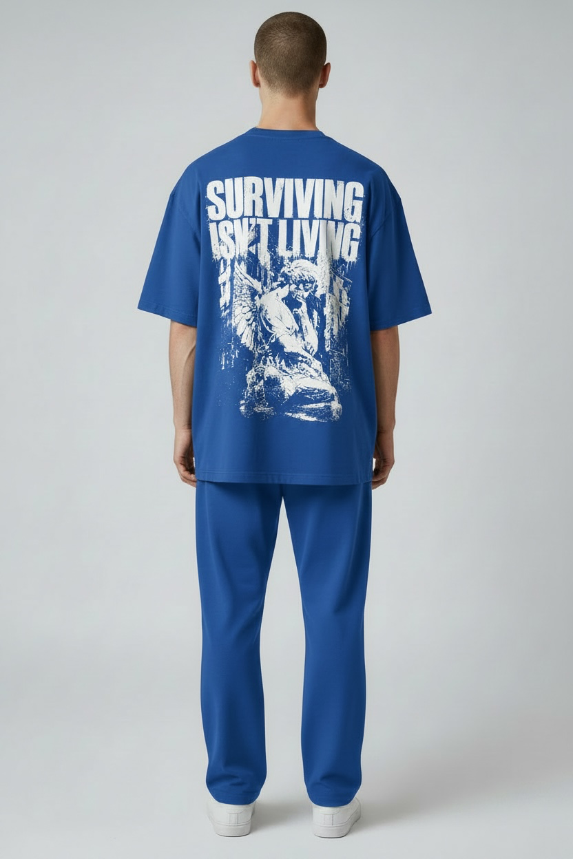 SURVIVING ISN'T LIVING – Oversized Tee
