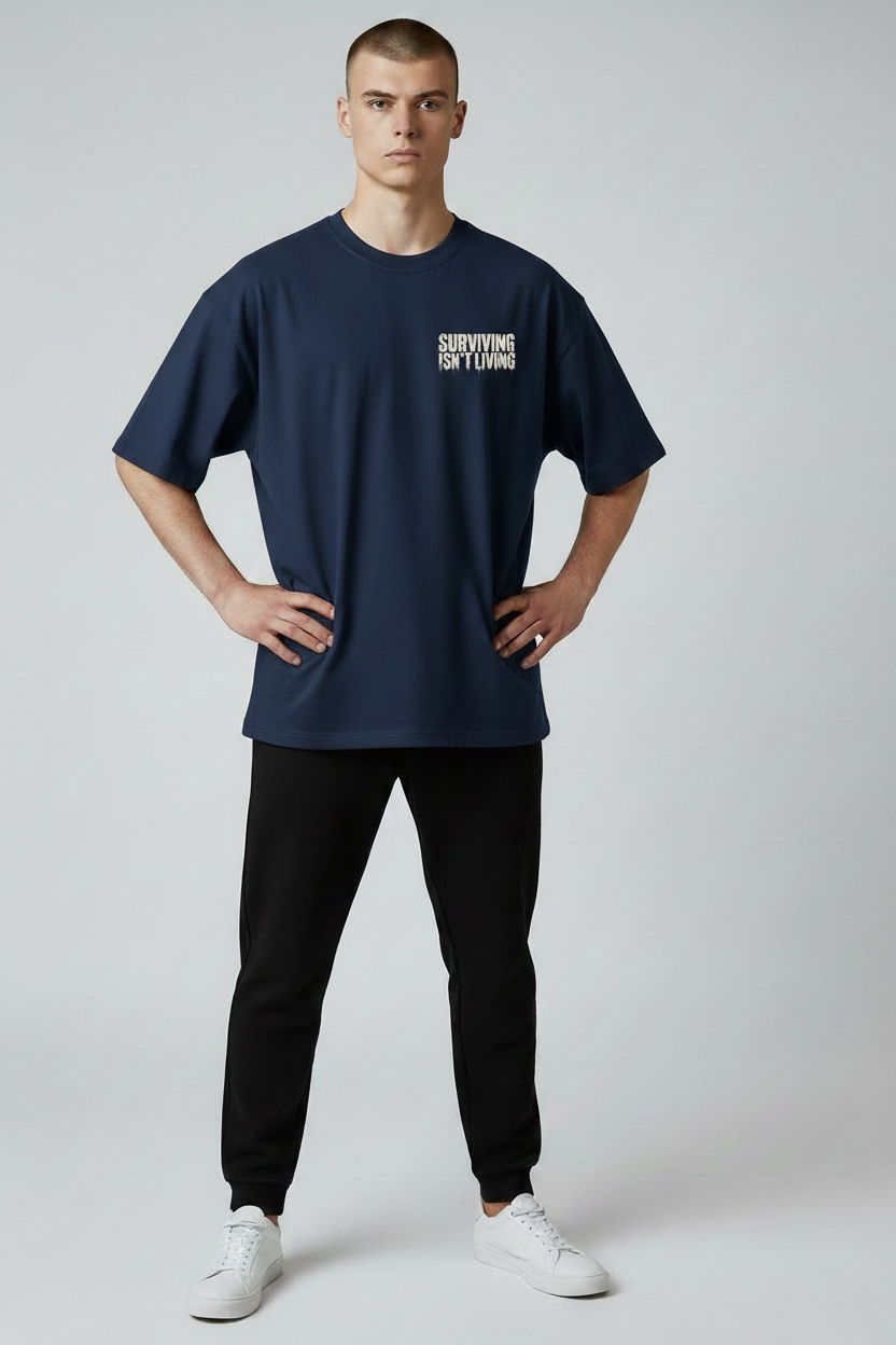 SURVIVING ISN'T LIVING – Oversized Tee