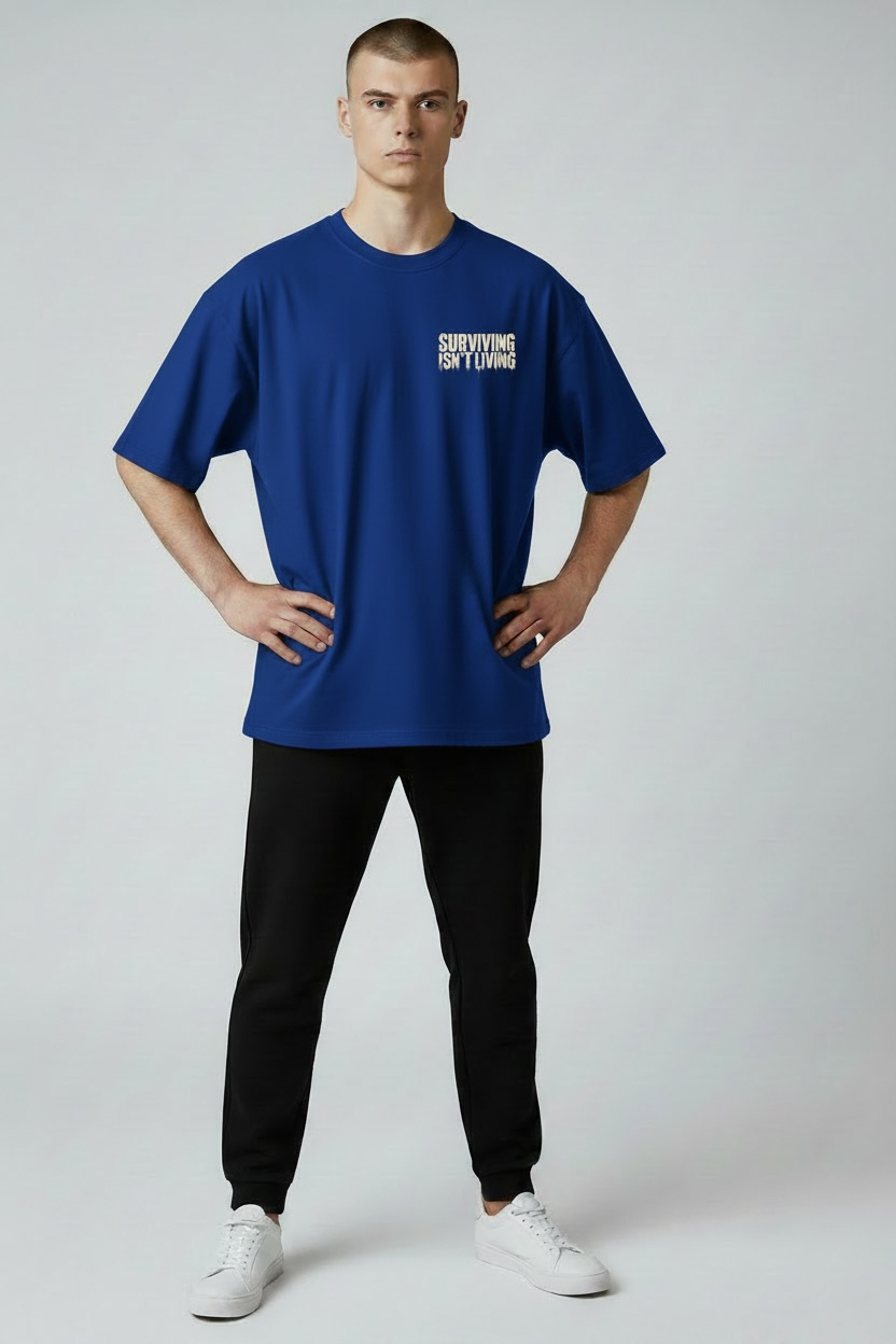 SURVIVING ISN'T LIVING – Oversized Tee